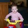 She loved to ride fourwheelers with mommy, daddy, sissy, so we got her one. She would hold the button down and never watched were she was going. She was happy.